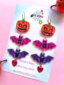 Jack-o-lantern bat statement earrings