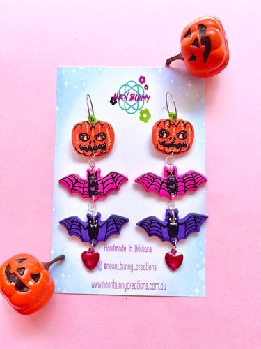 Jack-o-lantern bat statement earrings