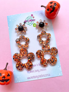 Spooky pumpkin daisy earrings