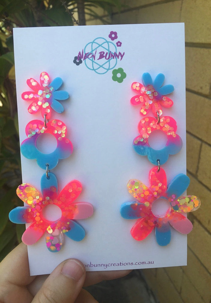 Electric pink and blue daisy earrings
