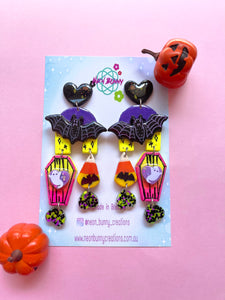 Spooky statement earrings