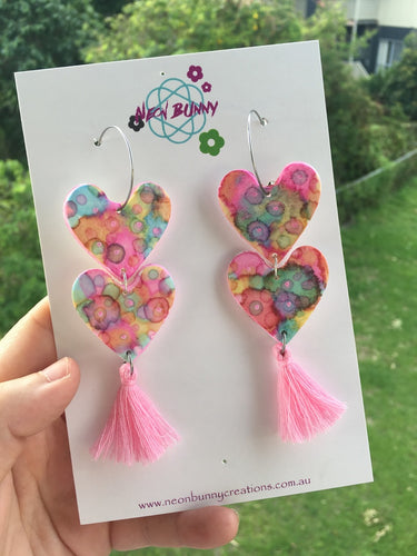 Tye dye pastel heart earrings with tassels