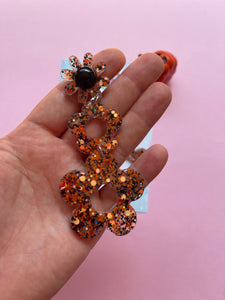 Spooky pumpkin daisy earrings