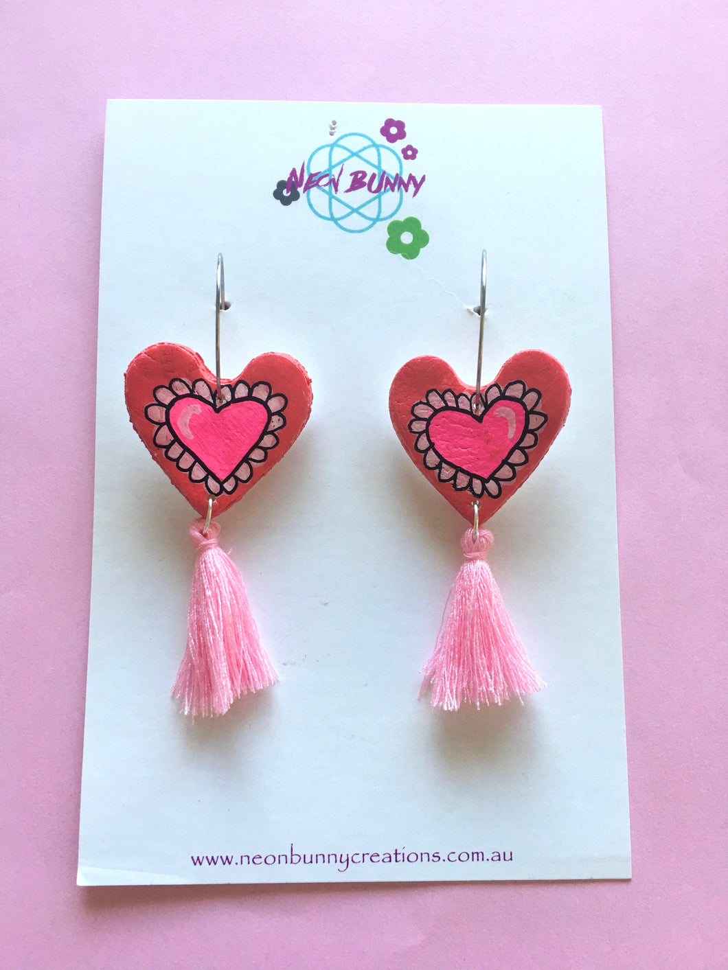 Puffy Heart Dangles With Pink Tassels