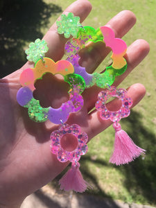 Electric pink daisy dangles with tassels