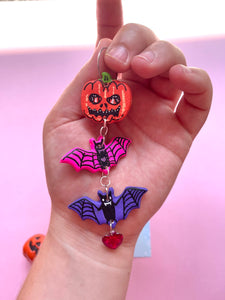 Jack-o-lantern bat statement earrings